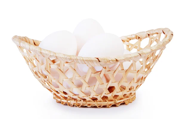 Chicken eggs in a basket — Stock Photo, Image