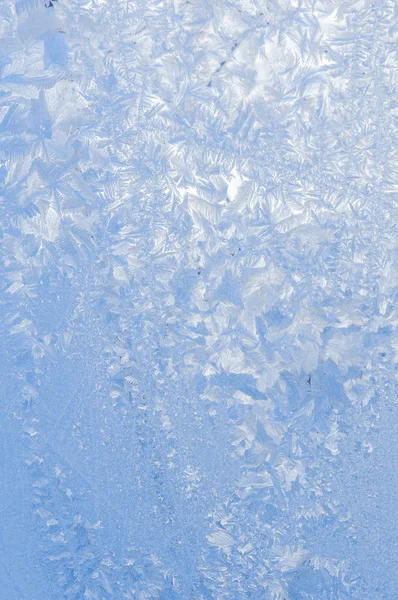 Bakgrund av vackert frostig mönster på glas — Stockfoto