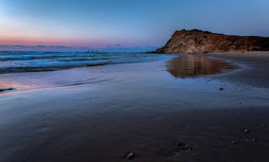 Beach at the sunset background