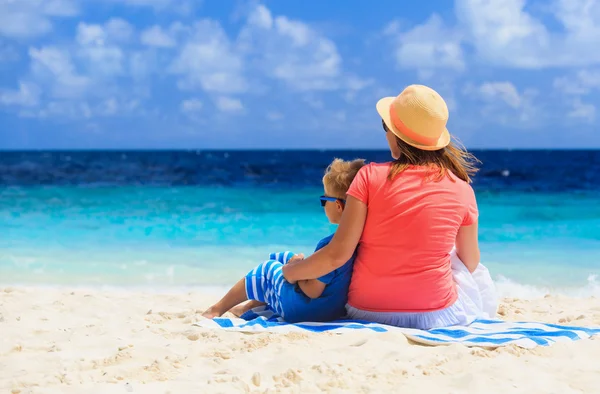 stock image mother and little son on beach