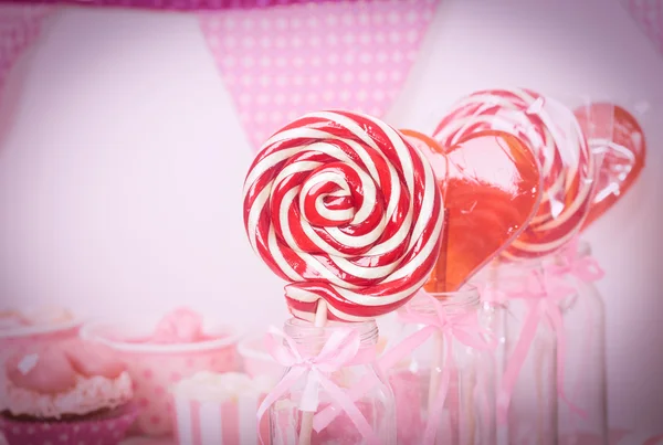 Lollipops in dessert table at girls party — Stock Photo, Image
