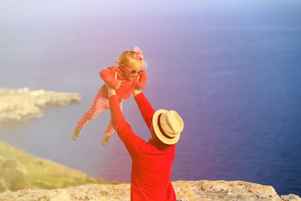 Father and little daughter play on summer sky — Stok fotoğraf