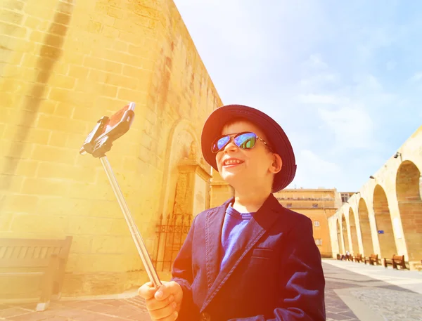 Little boy taking selfie stick picture while travel in Europe, Malta — Stock Photo, Image