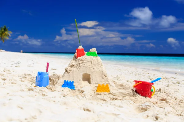 Sand castle on tropical beach — Stock Photo, Image