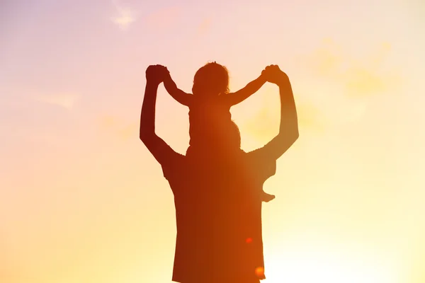 Father and daughter having fun at sunset — Stock Photo, Image