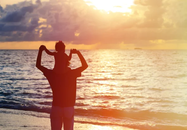 Father and daughter having fun on sunset sky — Stock Photo, Image