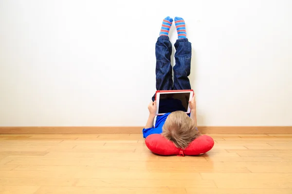 Little boy looking at touch pad — Stock Photo, Image