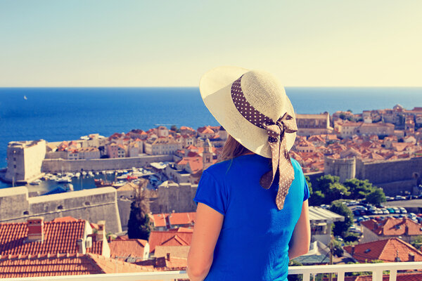 young woman looking at Dubrovnik, Croatia