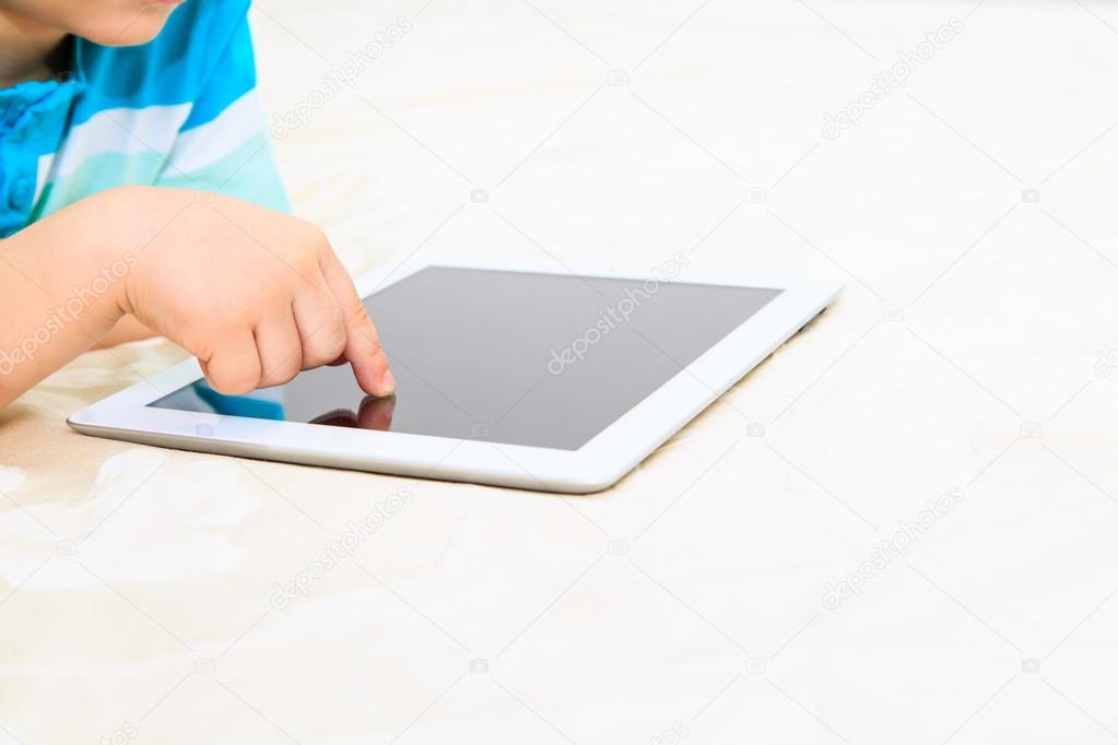 child  finger with touch pad, early education
