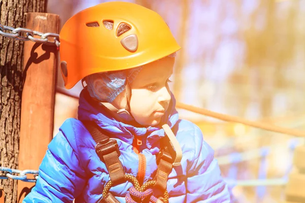 Little boy climbing in adventure activity park — Stock Photo, Image