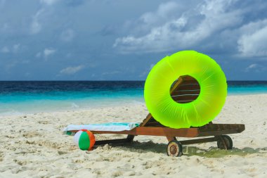 kids toys on tropical vacation