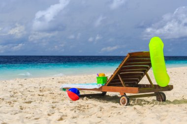 kids toys on tropical vacation