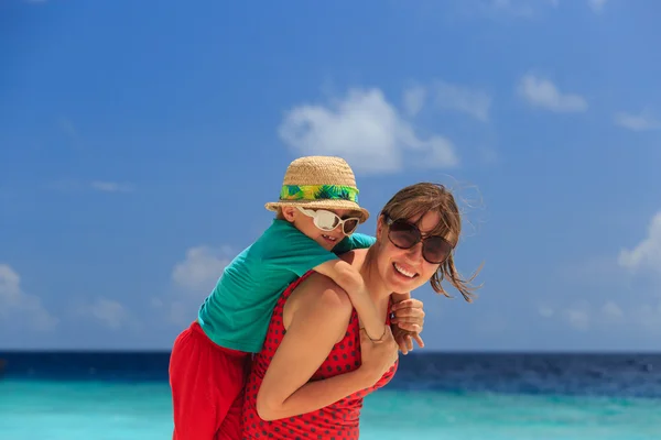 Mother and son on the beach vacation — Stock Photo, Image