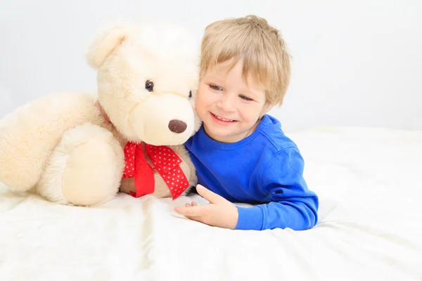 Cute little boy with teddy bear — Stock Photo, Image