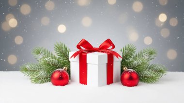 Karlı Noel Sahnesinde Kırmızı Kurdeleli Beyaz Hediye Kutusu, Bayram Kutlamaları İçin Mükemmel. Yüksek kalite fotoğraf