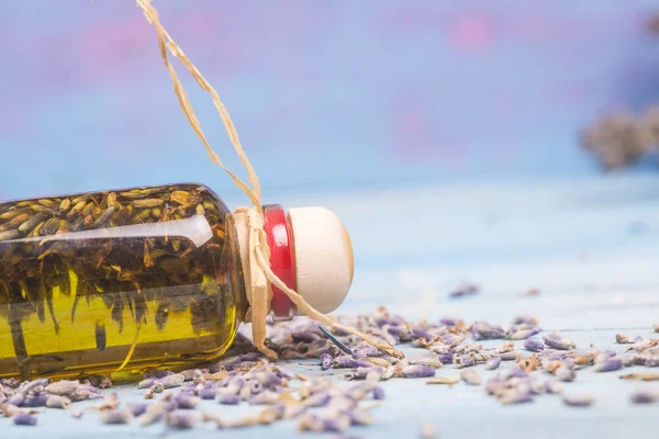 Olive oil flavored with lavender seeds — Stock Photo, Image