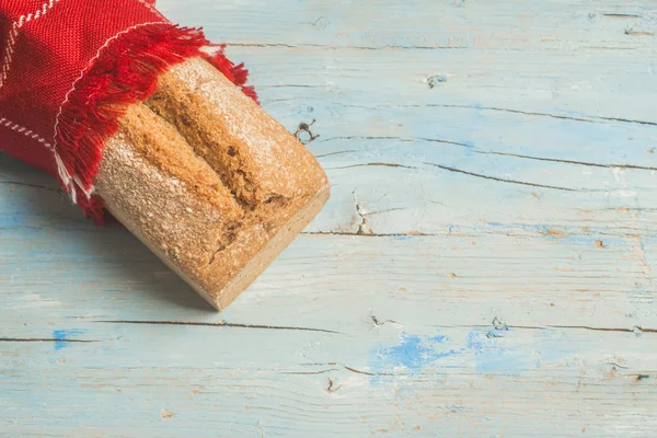 Spelt bread on rustic table — Stock Photo, Image