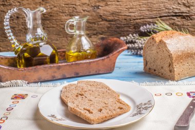 Spelt bread and olive oil clipart