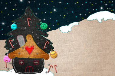 Çocuklar için şirin bir Noel kartı. Küçük komik bir ev ve karlı bir manzarada Noel ağacı, el yapımı kumaşlarla yapılmış, mesaj için yeri olan ya da fotoğraf koyulan.