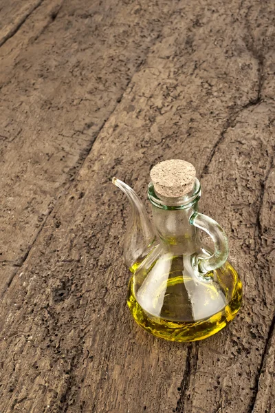 Glass bottle of olive oil — Stock Photo, Image