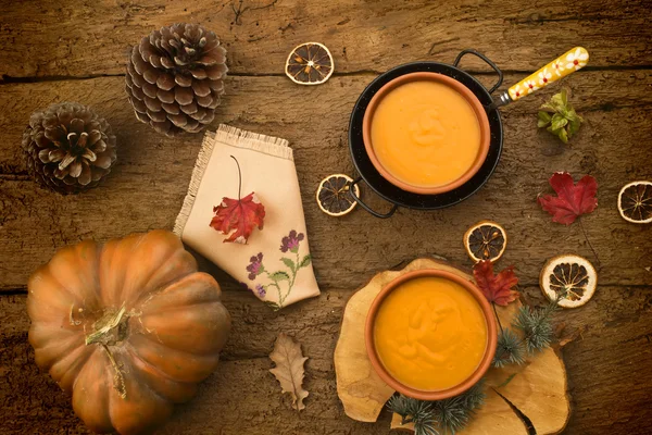 Pumpkin cream on a rustic table — Stock Photo, Image