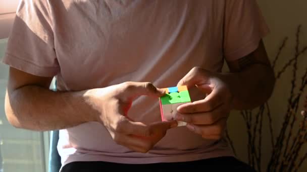 Young Man Sitting Chair Comfort His Own Home Solving Puzzle — Stock Video