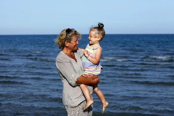 Grandmother with her granddaughter — Stock Photo, Image