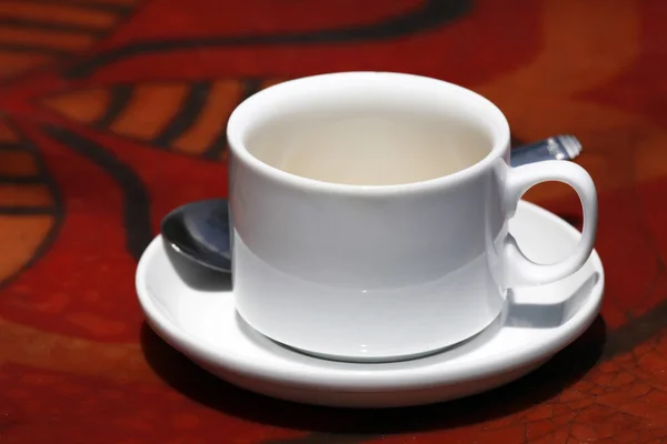 Taza blanca y cuchara — Foto de Stock