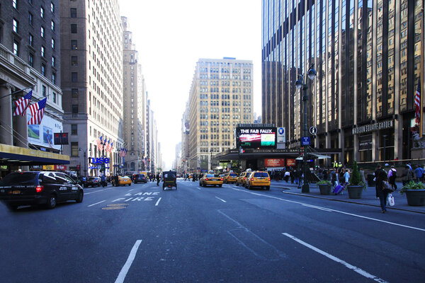 NEW YORK, USA - May 15, 2013 : Unidentified people tourists and city residents on the street of New York