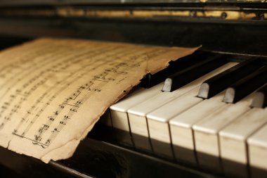 Piano and old notes clipart