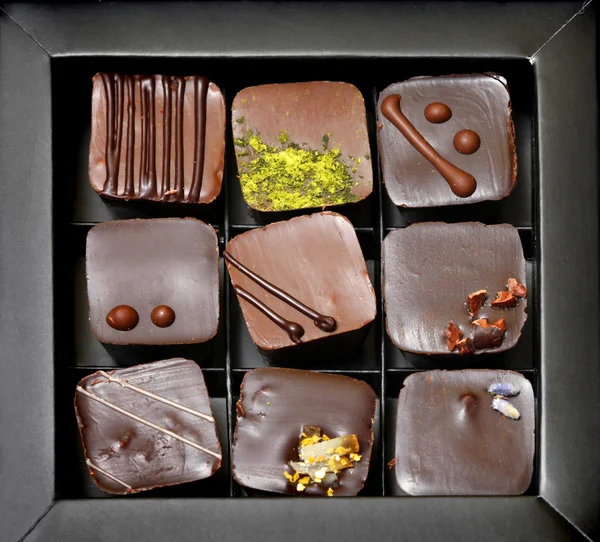 Chocolate candies in a box — Stock Photo, Image