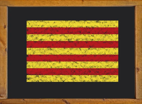 Флаг автономного сообщества Каталонии на доске — стоковое фото