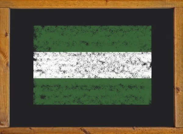 黒板にアンダルシアの自治コミュニティの旗 — ストック写真