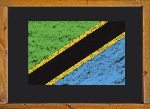 Tansania Flagge auf einer Tafel — Stockfoto