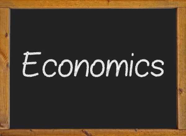 Közgazdaságtan írásbeli egy táblára — Stock Fotó