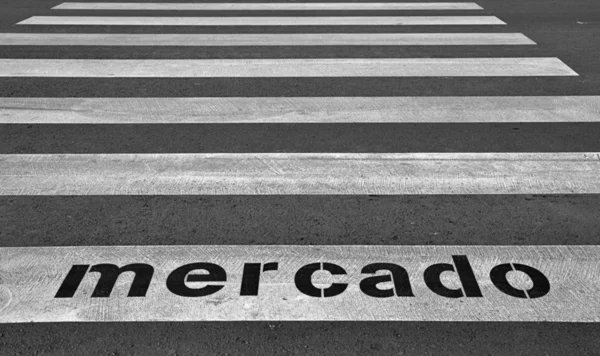 Zebra crossing with the word market in Spanish — Stock Photo, Image