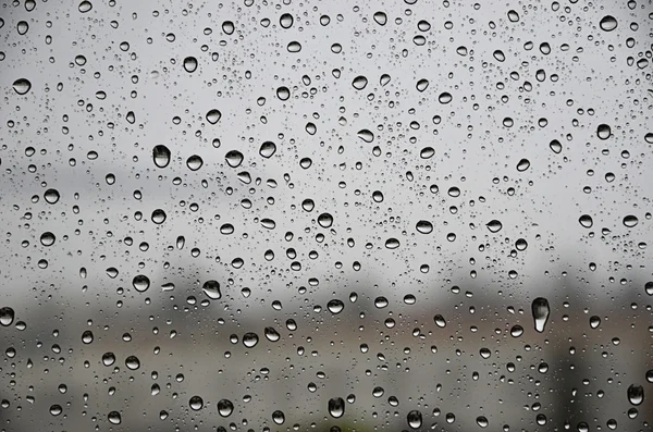 Regentropfen auf dem Glas — Stockfoto