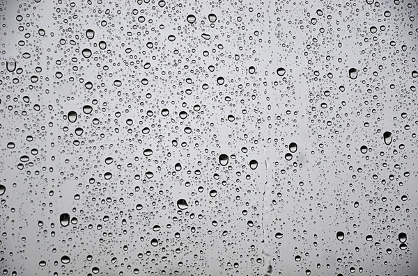 Gotas de lluvia en el vidrio — Foto de Stock