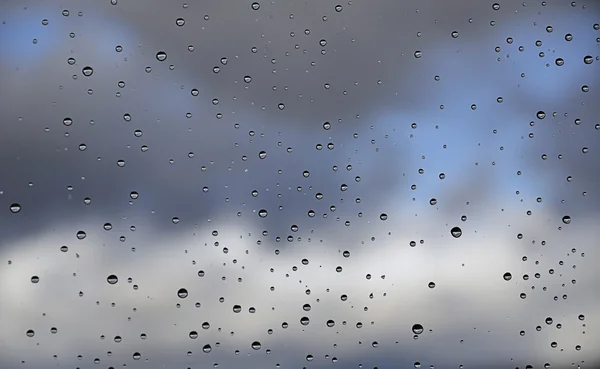 Gotas de chuva no vidro — Fotografia de Stock