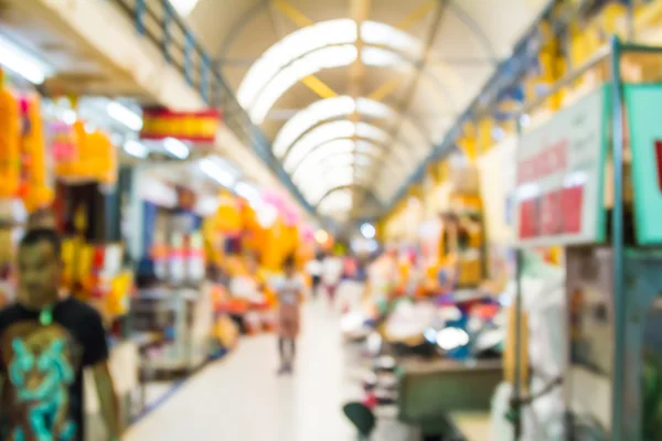 Abstracto borroso gente de compras en feria del mercado . — Foto de Stock