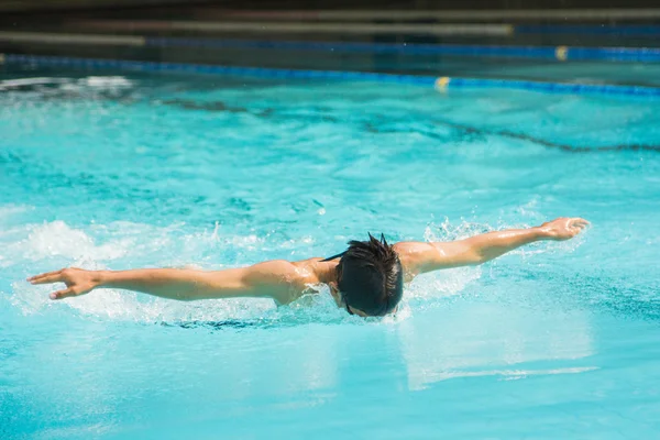 Butterfly stroke swimming — Stock Photo, Image