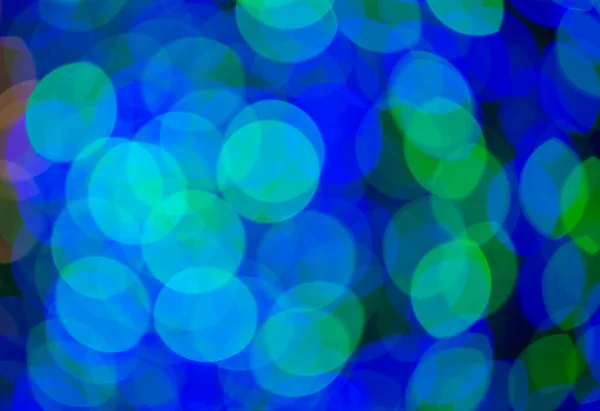 Multicolored Large Bokeh Spots Blue Yellow Green Bokeh Christmas Garland — Stock Photo, Image