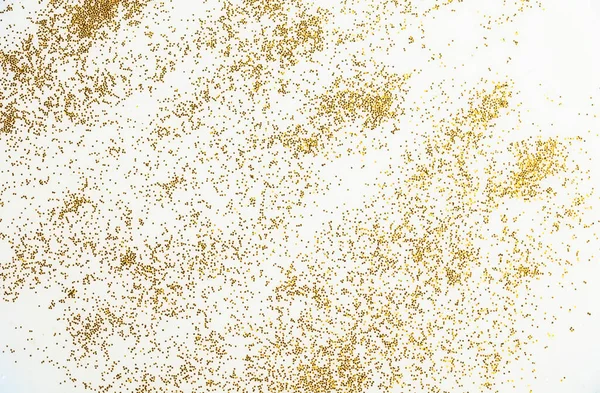 Slavnostní Nebo Okouzlující Zázemí Zlaté Jiskry Rozptýlené Bílém Pozadí — Stock fotografie