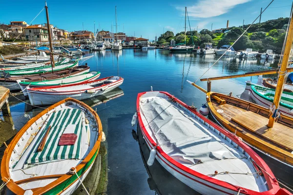 Wooden boat in Stintino harbor — Stock Photo, Image