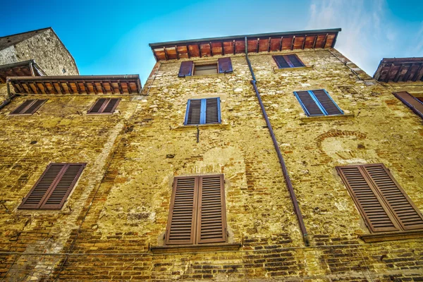 Cihlová zeď v San Gimignano — Stock fotografie