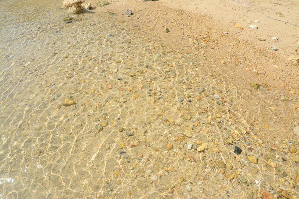 Seixos e água limpa em Sardenha — Fotografia de Stock