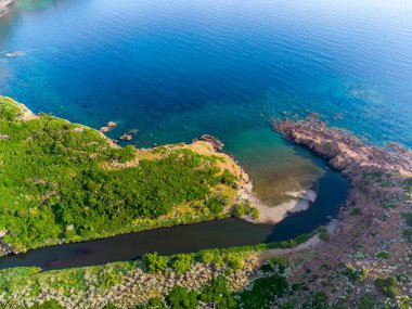 Rio Mannu outlet seen from above at sunset. Sardinia, Italy
