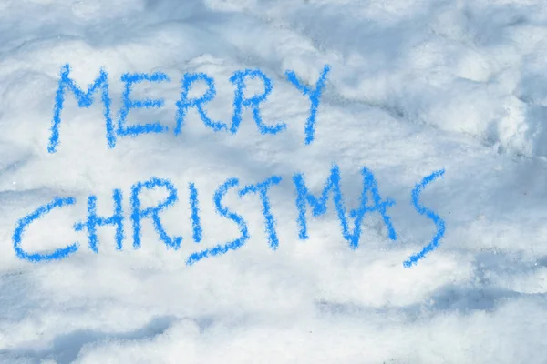 Veselé Vánoce, napsaný ve sněhu — Stock fotografie