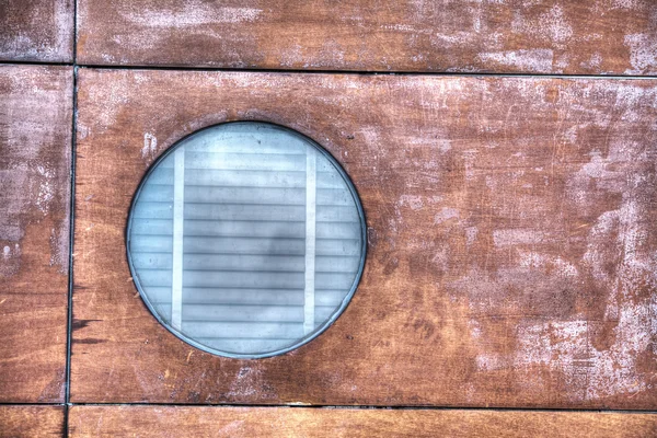 Porthole in the wood — Stock Photo, Image