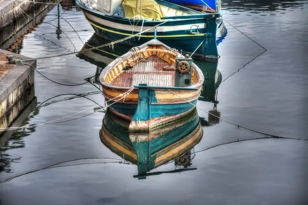 Small wooden boat moored in Temo river — Stock Photo, Image